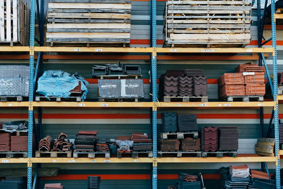 Construction materials stacked on industrial shelving